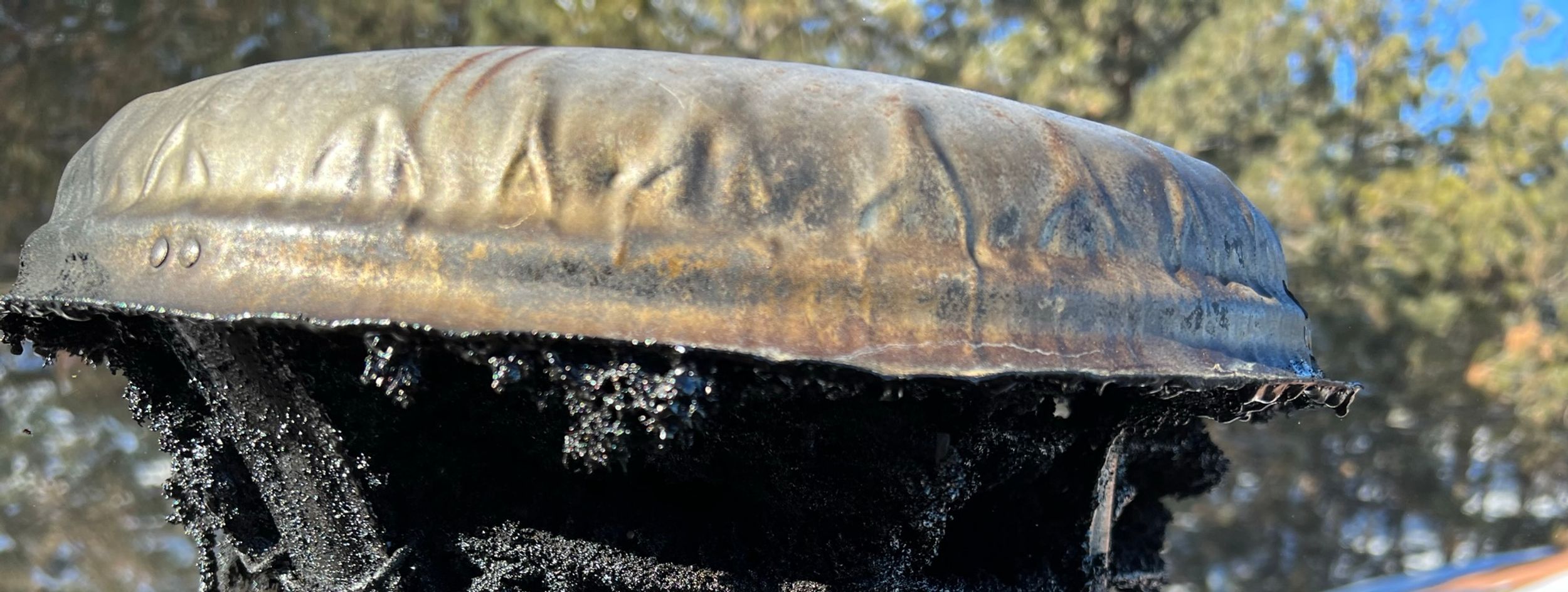 soot buildup on chimney cap